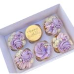 Purple cupcakes with butterflies