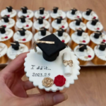Twelve Graduation Theme Cupcakes - 2